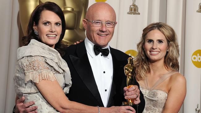 Best Supporting Actor Winner Heath Ledger's family, mother Sally, father Kim and sister Kate pose with the trophy at the 81st Academy Awards in 2009. Picture: AFP