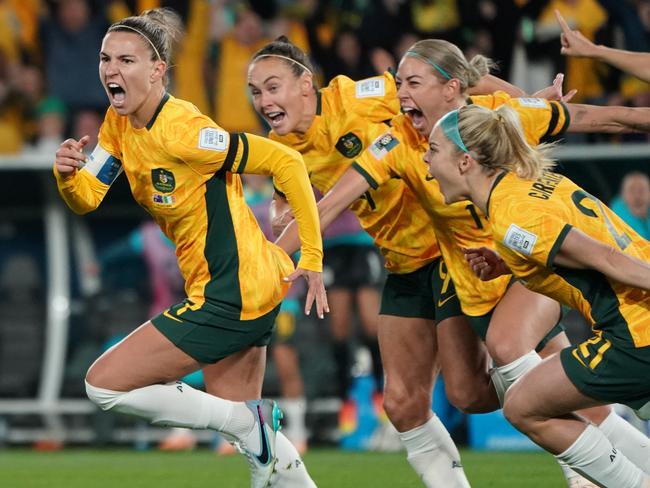 Steph Catley (L) celebrates after scoring a penalty in the Matildas’ 1-0 win over Ireland on Thursday. Picture: Stephanie Meek/CameraSport/Getty Images