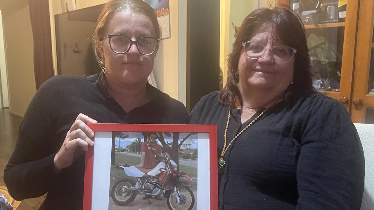 Trina and Tania Roy with a photo of Brayden.