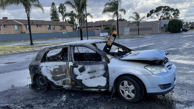 A man's been arrested after allegedly setting fire to a car at West Lakes Shore. Picture: Ashley Wick/9 News