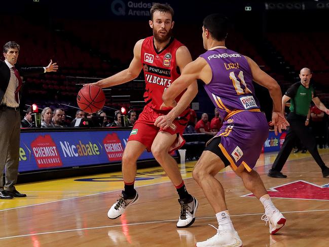 Nick Kay looks to pass the ball during game three of the NBL grand final series.