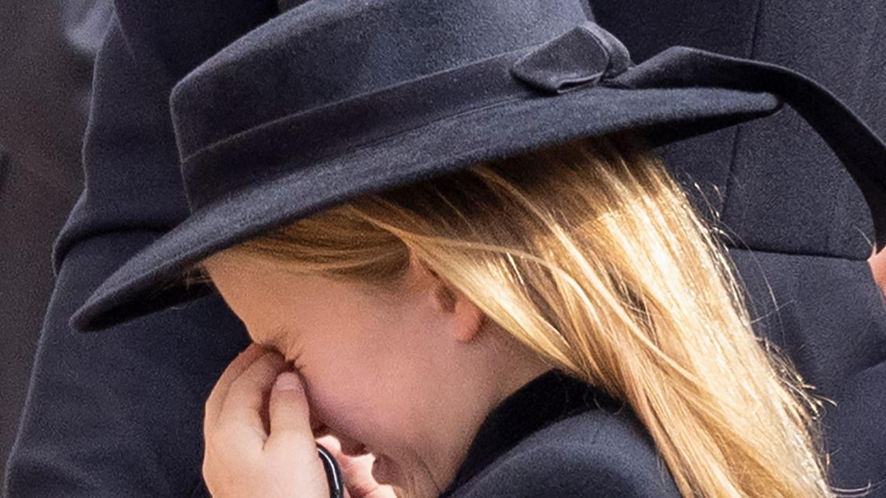 Britain's Princess Charlotte of Wales appears to cry during the State Funeral Service for Britain's Queen Elizabeth II.