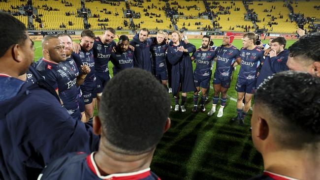 Rebels players form a huddle after the Super Rugby Pacific quarterfinal against the Hurricanes in June, the club’s final match. Picture: Getty Images