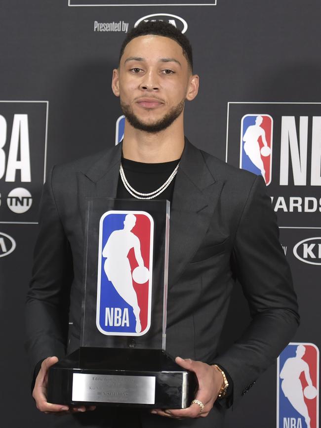 Ben Simmons with the NBA Rookie of the Year award. Picture: Richard Shotwell/Invision/AP