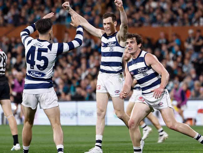 Close, Cameron and Mannagh celebrate another goal. Picture: Michael Willson/AFL Photos