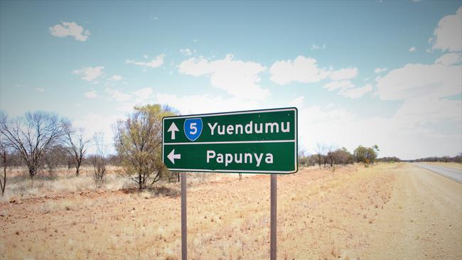 The sign for Yuendumu and Papunya on the Tanami Highway.