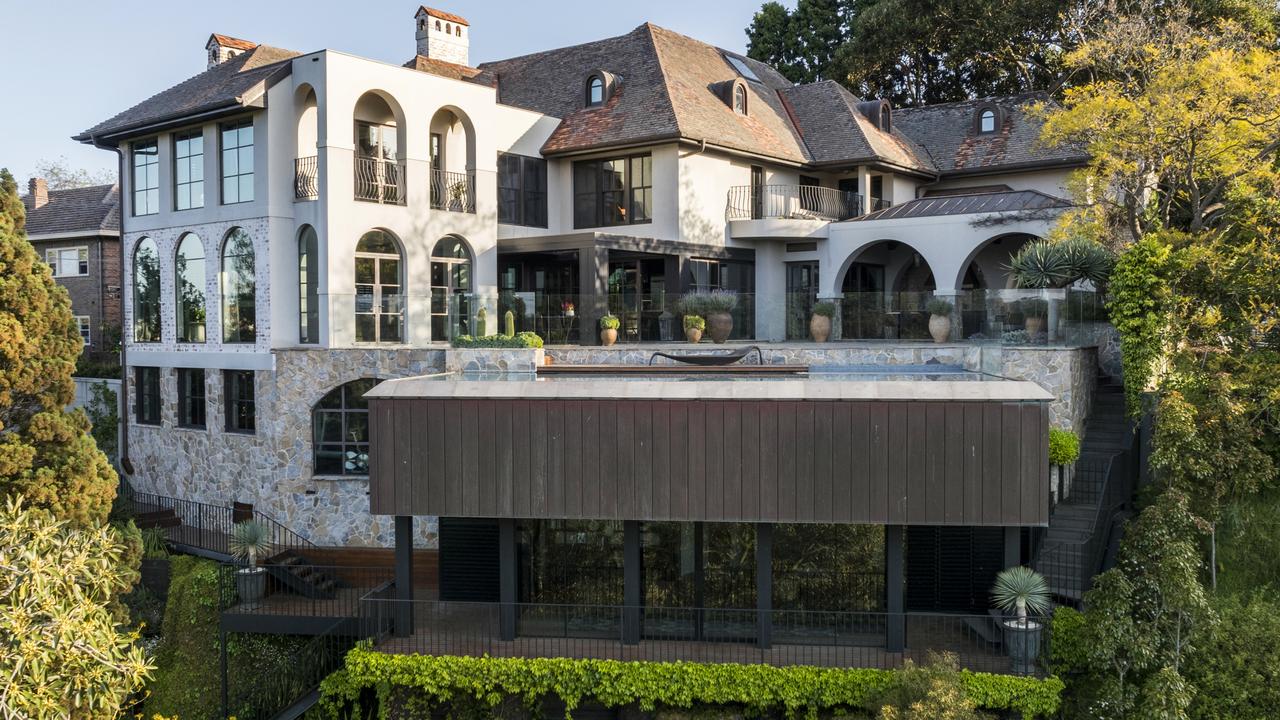 The riverfront Toorak mansion owned by the wife of former Mitre 10 boss is up for sale.