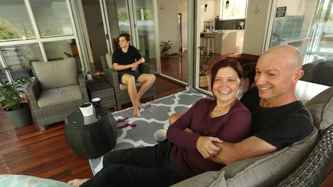 ‘We were looking for a year and knew what we wanted’: Cathy Larkins, Matt Smith and their son Zach in their new home in Tarragindi, Brisbane. Picture: Lyndon Mechielsen