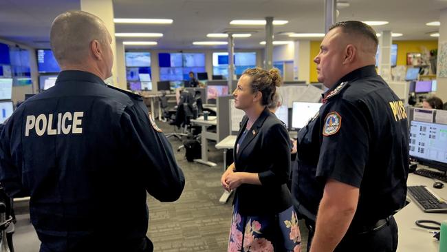 Chief Minister Lia Finocchiaro, JESCC Superintendent Bradley Fox, and Acting NT Police Commissioner Martin Dole. The Joint Emergency Services Communications Centre at the Peter McAulay Centre is being expanded and modernised. Picture: Fia Walsh.