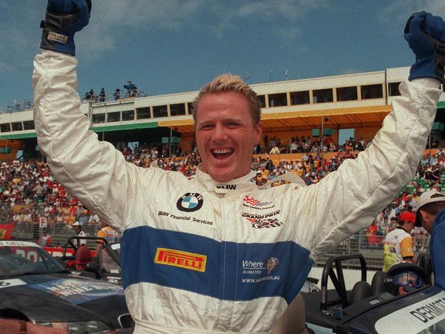 Former AFL player and TV personality Dermott Brereton wins the celebrity race at Albert Park prior in 1999.