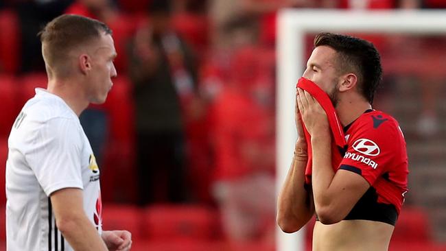 Apostolos Stamatelopoulos of Adelaide United reacts after being shown a red card after scoring two goals against Wellington Phoenix last Sunday. Picture: AAP Image/James Elsby