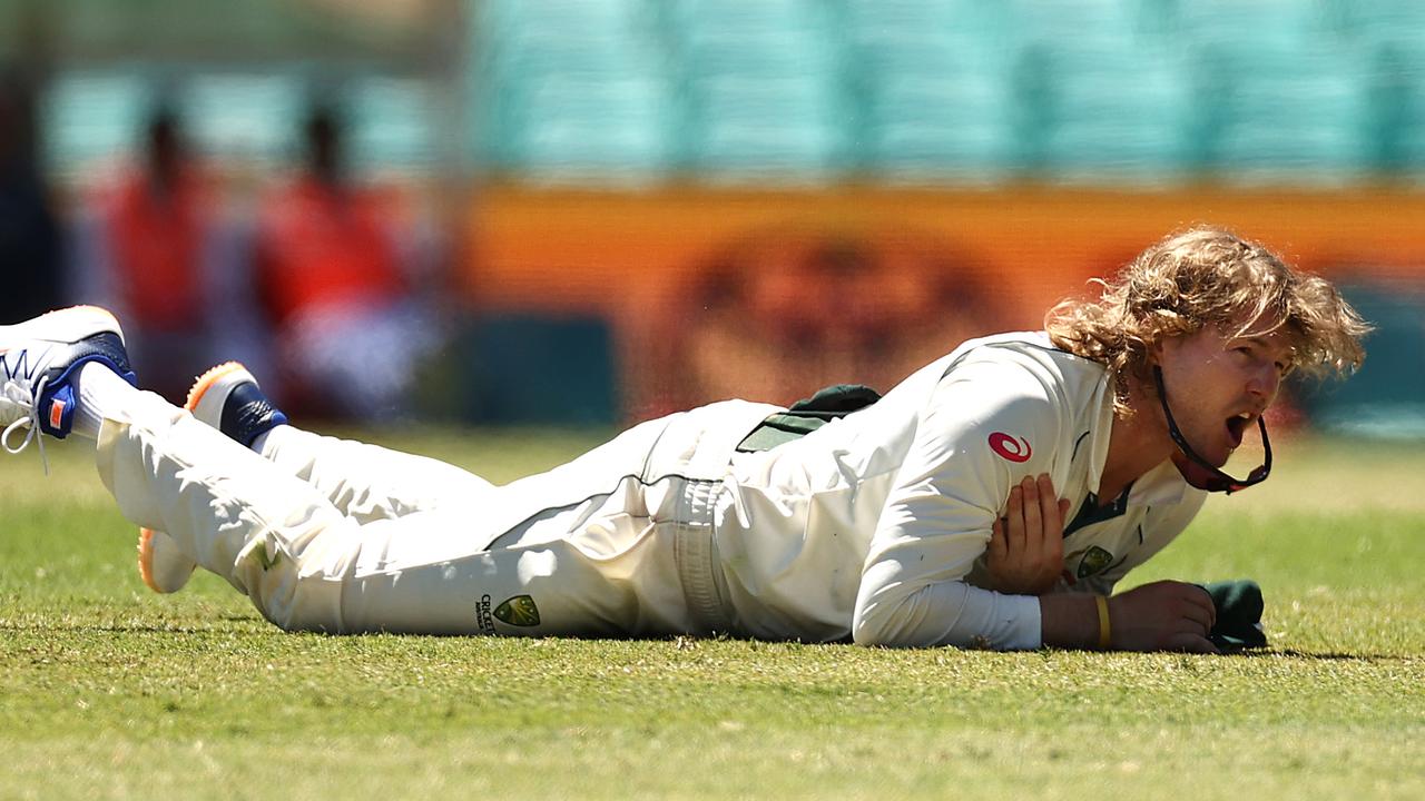 Will Pucovski injured his shoulder diving in the field on Test debut at the SCG. Picture: Ryan Pierse/Getty Images