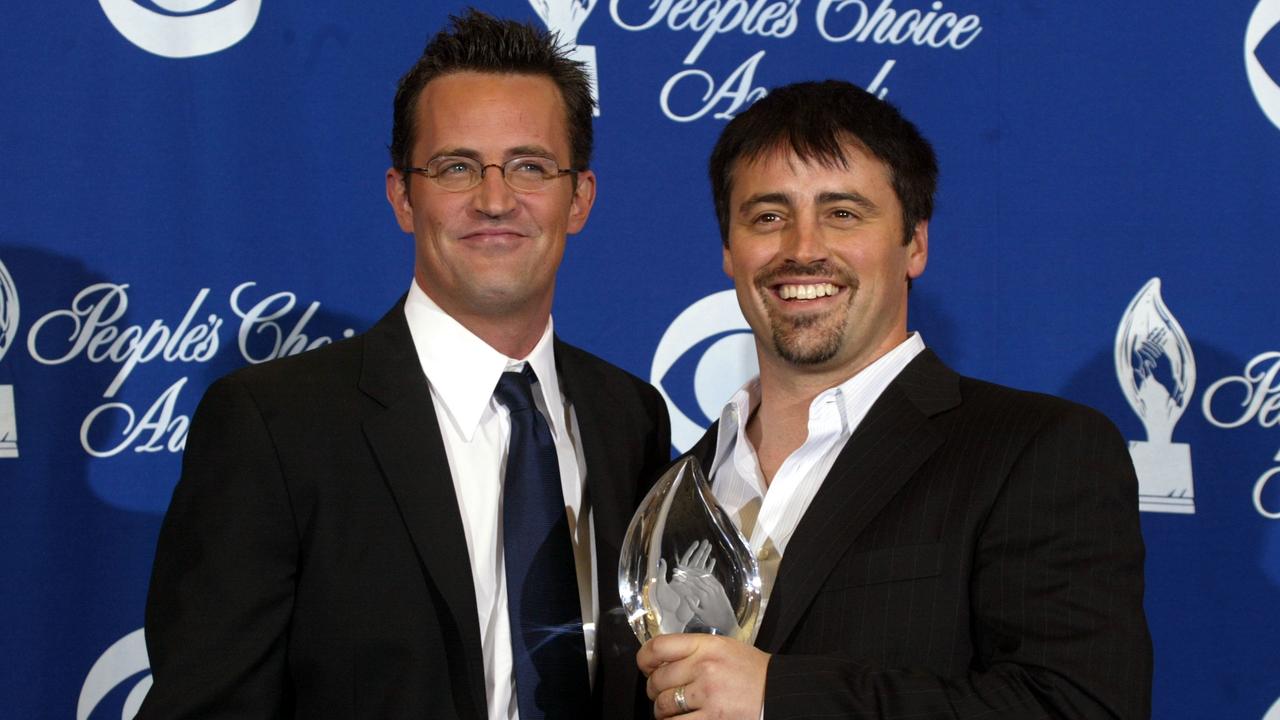 PASADENA, CA – JANUARY 11: Actors Matthew Perry and Matt LeBlanc pose backstage during the 30th Annual People's Choice Awards at the Pasadena Civic Auditorium January 11, 2004 in Pasadena, California. (Photo by Carlo Allegri/Getty Images)