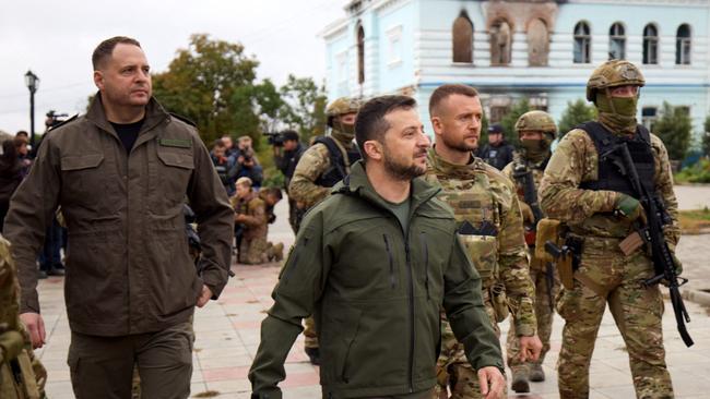 Ukrainian President Volodymyr Zelensky (centre) visits the de-occupied city of Izyum, Kharkiv region. Picture: AFP