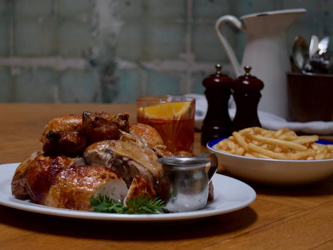 The Paddington’s rotisserie chicken and Negroni with roast broccoli and carrots. Picture: Jenifer Jagielski