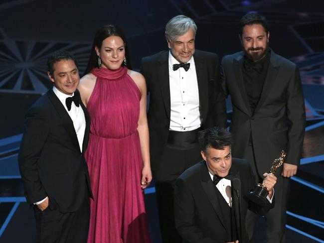 Director Sebastian Lelio (at microphone) accepts Best Foreign Language Film for A Fantastic Woman. Picture: Getty Images