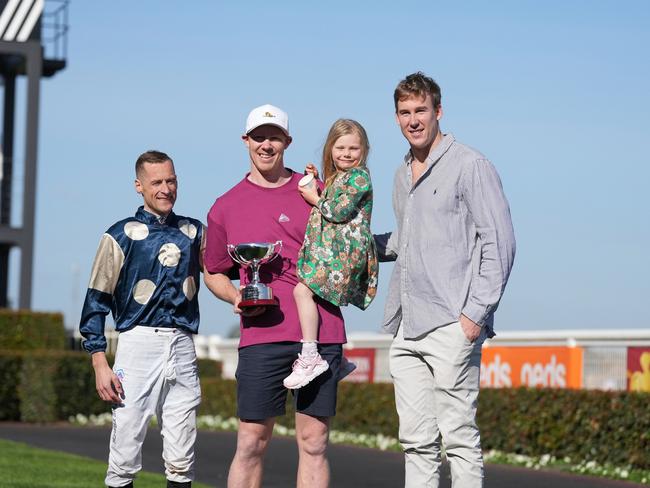 Blake Shinn with Jack Riewoldt and Tom Lynch, owners of Soulcombe, after winning the Tile Importer Heatherlie Stakes at Caulfield Racecourse. Picture: Getty Images