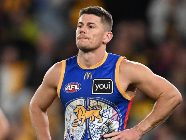 MELBOURNE, AUSTRALIA - MAY 26: Dayne Zorko of the Lions (C) and Jack Payne of the Lions (R) looks dejected after the round 11 AFL match between Hawthorn Hawks and Brisbane Lions at Marvel Stadium, on May 26, 2024, in Melbourne, Australia. (Photo by Daniel Pockett/Getty Images)