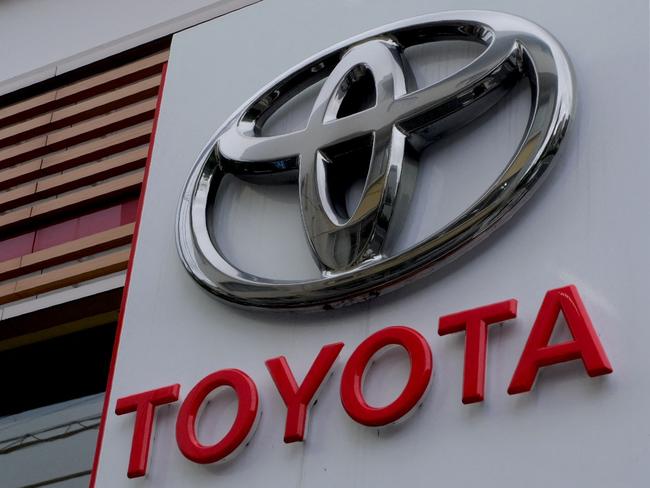 The logo of Japanâs Toyota Motor is displayed at a car showroom in Tokyo on August 4, 2022. (Photo by Kazuhiro NOGI / AFP)