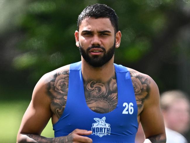 MELBOURNE, AUSTRALIA - NOVEMBER 17: Tarryn Thomas of the Kangaroos runs laps during a North Melbourne Kangaroos AFL training session at Arden Street Ground on November 17, 2023 in Melbourne, Australia. (Photo by Quinn Rooney/Getty Images via AFL Photos)