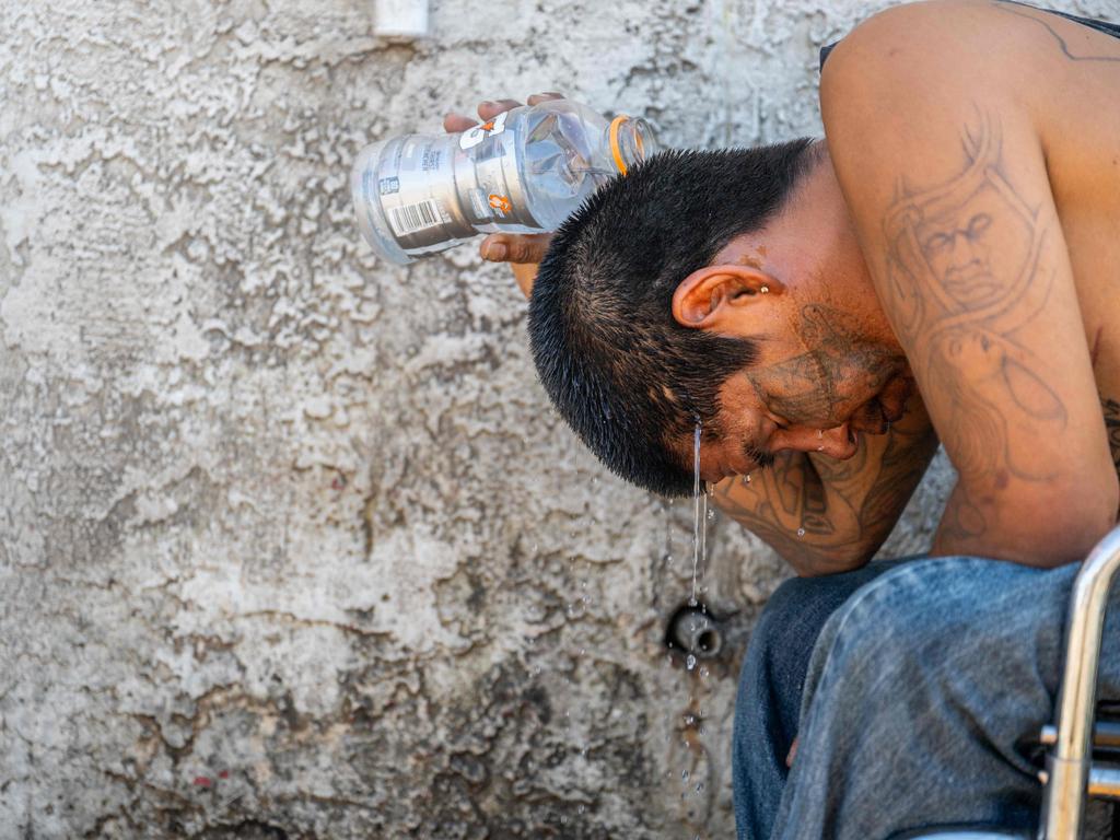 Dee Lee, 34, cools off amid searing heat in Phoenix, Arizona. Picture: Getty Images/AFP