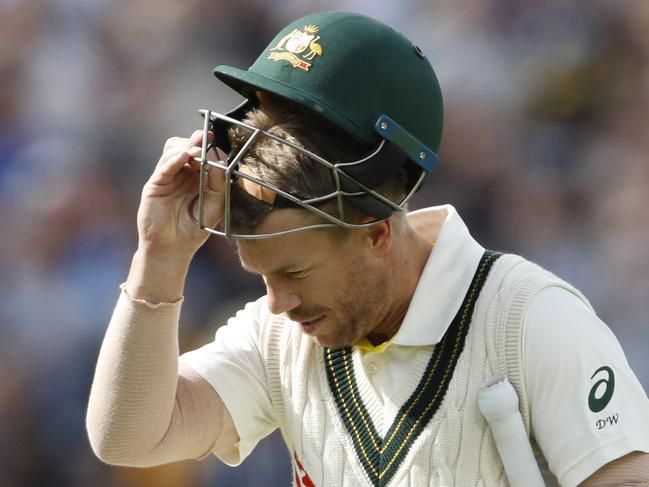 Australia's David Warner leaves the field after being dismissed during day four of the fourth Ashes Test cricket match between England and Australia at Old Trafford in Manchester, England, Saturday, Sept. 7, 2019. (AP Photo/Rui Vieira)