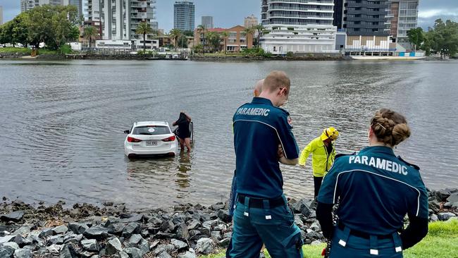 The Mazda in the Nerang River at Amalfi Dr, Surfers Paradise. Picture: Queensland Ambulance Service