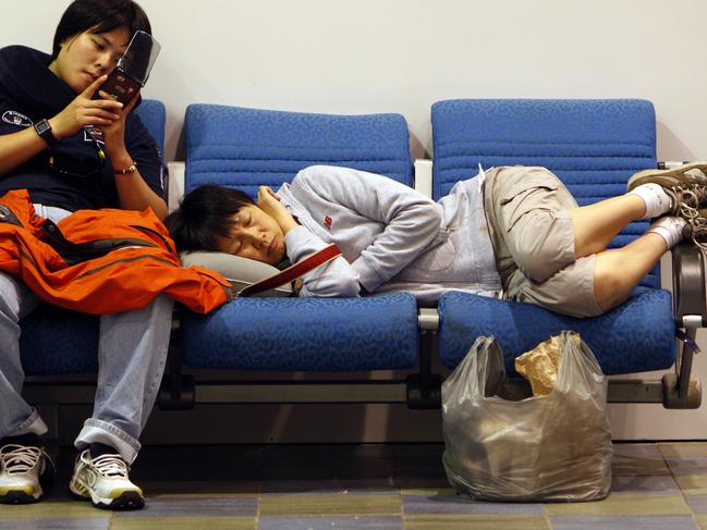 Planes scheduled to land at Cairns Domestic Airport were diverted to Townsville after an instrument failed in Cairns. Tired passengers wait to catch planes after being delayed for hours.