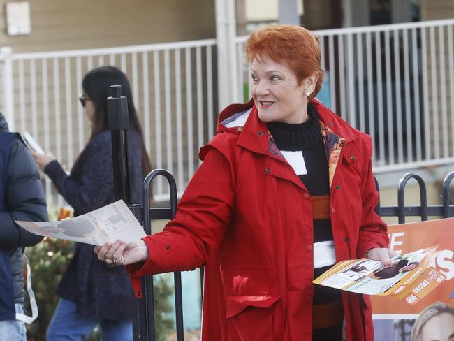 One Nation senator Pauline Hanson handing out how to vote cards for the party at Lansdowne Crescent Primary School in West Hobart. Picture: Nikki Davis-Jones