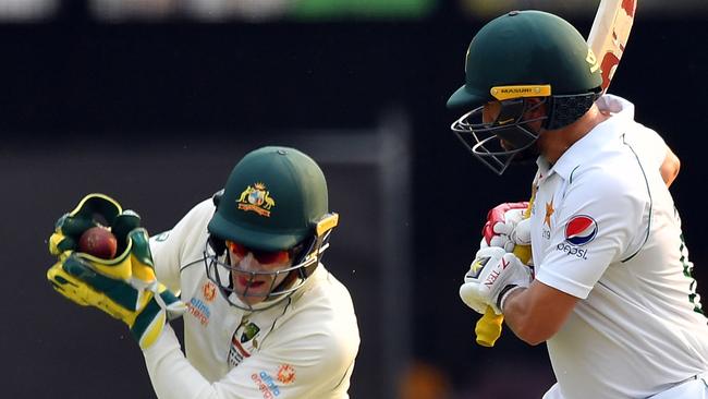 Tim Paine, keeping behind Pakistan’s Yasir Shah, has been a steadying inlfuence for Australian cricket on and off the field. Picture: Saeed Khan/AFP