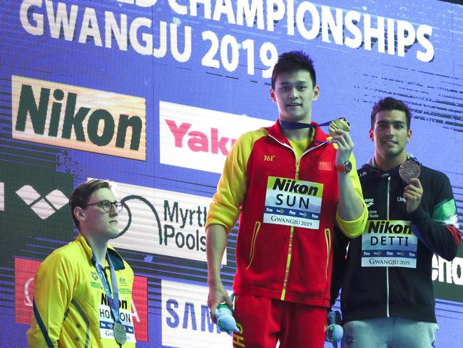 Mack Horton refuses to stand with Sun Yang on the podium.