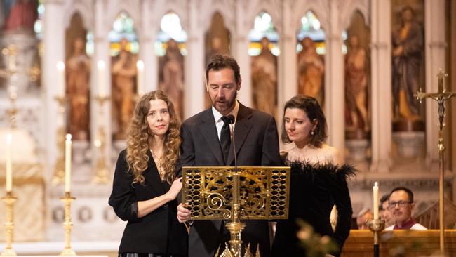 Bianca Spender, Alex Schuman and Allegra Spender deliver the eulogy at their mother’s state funeral, St Mary's Cathedral, Sydney in April. Picture: Giovanni Portelli/Catholic Archdiocese of Sydney via Getty Images