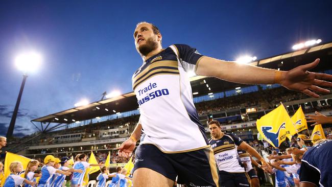 Ben Alexander of the Brumbies runs onto the field at GIO Stadium.