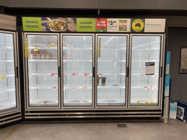 Bare shelves at Woolworths as shortages worsen. Picture: Glenn Campbell