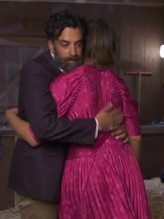 Ankur comforts Sharon after the loss.