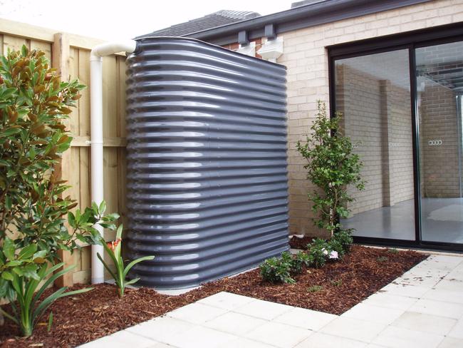 Bluescope rainwater tank with corrugated finish provides water for the garden and other uses in the home. Picture: Supplied