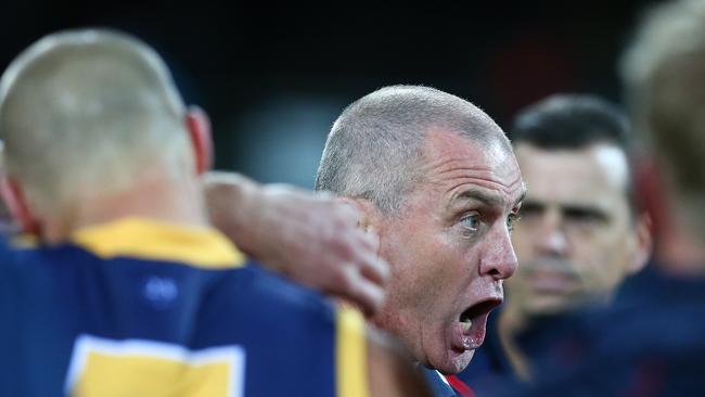 Phil Walsh gets animated with the Crows at three-quarter time of a loss to Hawthorn. Picture: Sarah Reed.