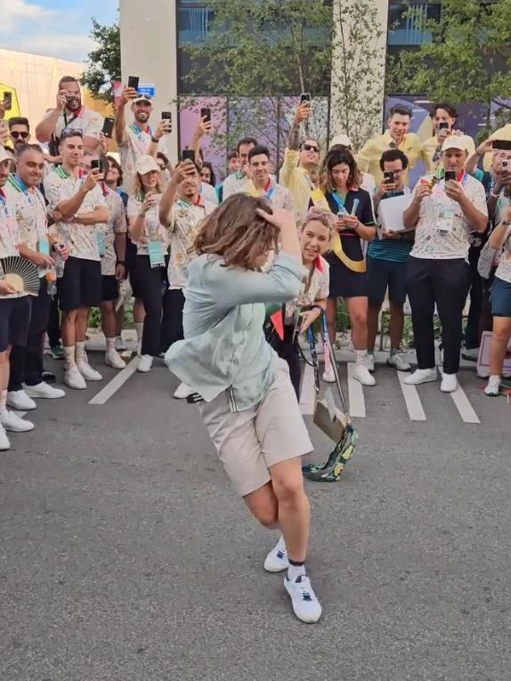 Raygun breakdancing in the Olympic village before the closing ceremony.