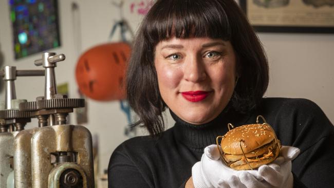 Hobart artist Emma Bugg who has created a wearable brooch out of a Big Mac burger that will be part of MONA gala auction.  Picture: Chris Kidd