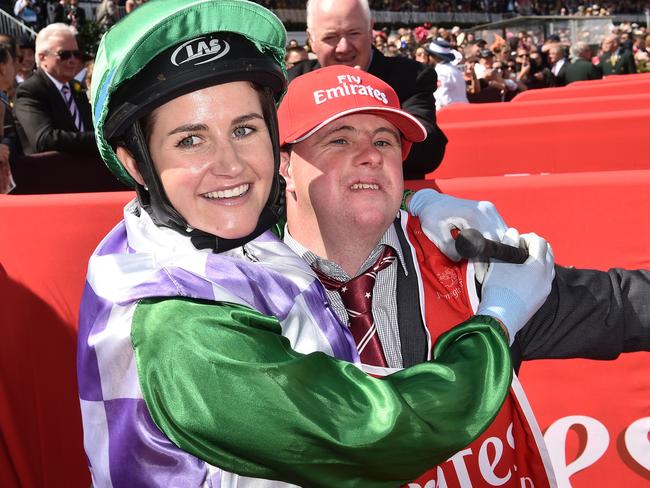 Michelle Page and Stevie Payne celebrate after Prince of Penzance’s Melbourne Cup win.