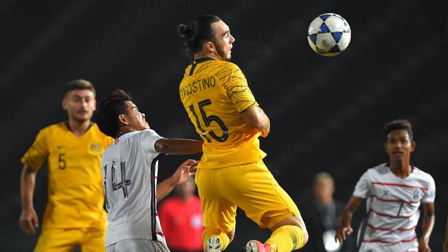 Nick D'Agostino in action against Cambodia earlier in the qualification tournament. Picture: AFP
