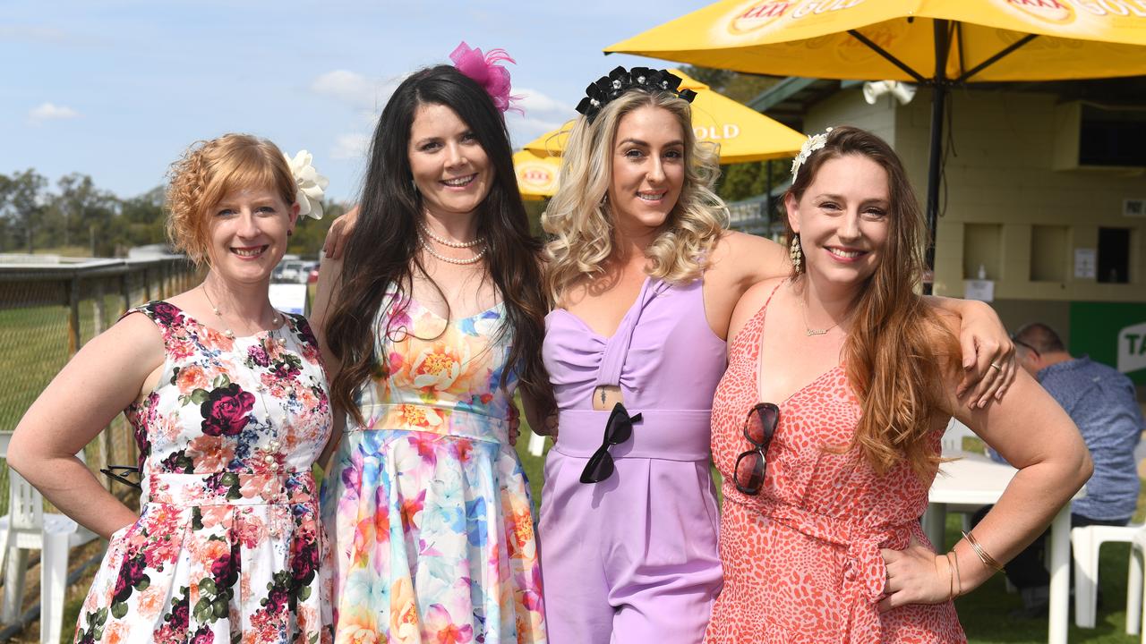 FASHION ON DISPLAY: Meagan Wheeler-Rogers, Kate Rosier, Amy Greig and Jessica Greig at the Lockyer Valley Turf Clubs Tradies Race Day, Saturday, September 5, 2002. PHOTO: ALI KUCHEL