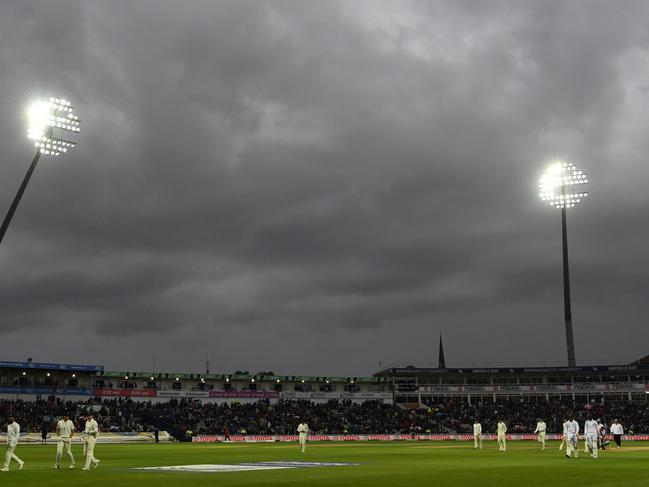 The Edgbaston floodlights on under stormy skies during the experimental day-night Test match in 2017. Picture: AFP / Paul Ellis / ECB