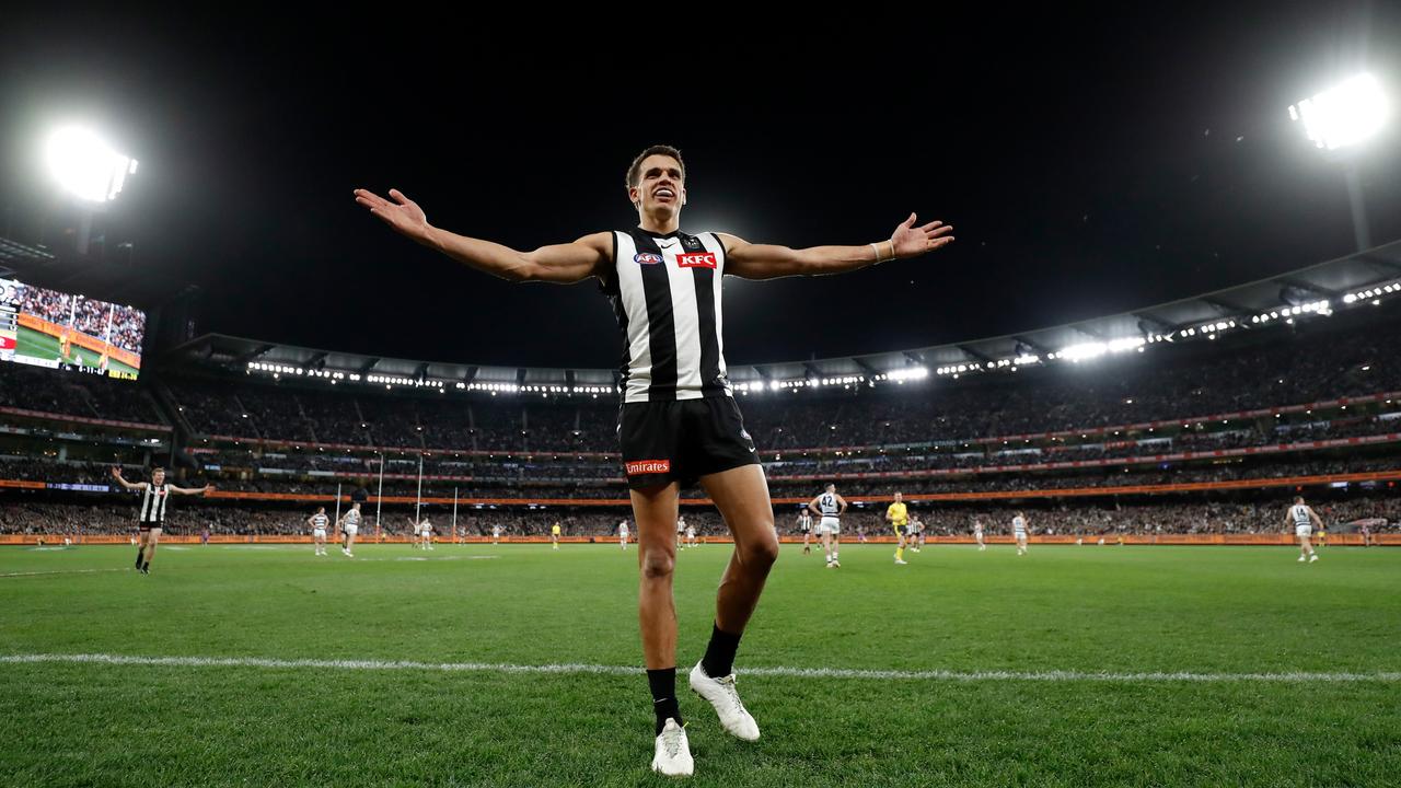 MELBOURNE, AUSTRALIA – SEPTEMBER 03: Ash Johnson of the Magpies celebrates a goal during the 2022 AFL First Qualifying Final match between the Geelong Cats and the Collingwood Magpies at the Melbourne Cricket Ground on September 3, 2022 in Melbourne, Australia. (Photo by Dylan Burns/AFL Photos via Getty Images)