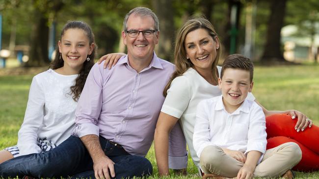 Michael Daley with wife Christina and children Austin, 8, and Olivia, 11, in Yarra Bay. Picture: Justin Lloyd