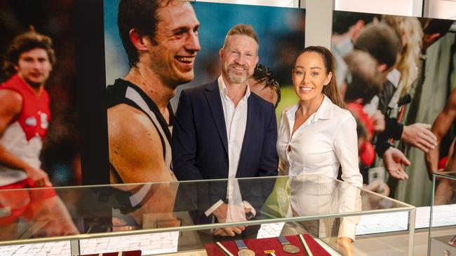 Nathan Buckley and partner Brodie at the opening of Collingwood’s Magpie Legend Exhibition at the Collingwood museum. Picture: Jason Edwards