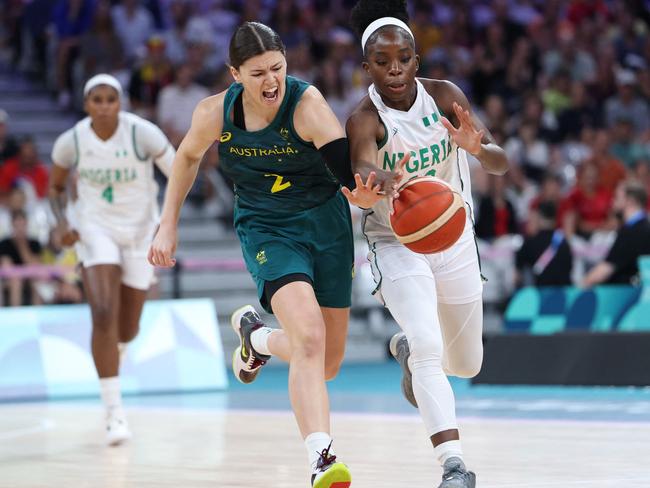 Australia's Jade Melbourne fights for the ball with Nigeria's Promise Amukamara. Picture: Thomas COEX / AFP.