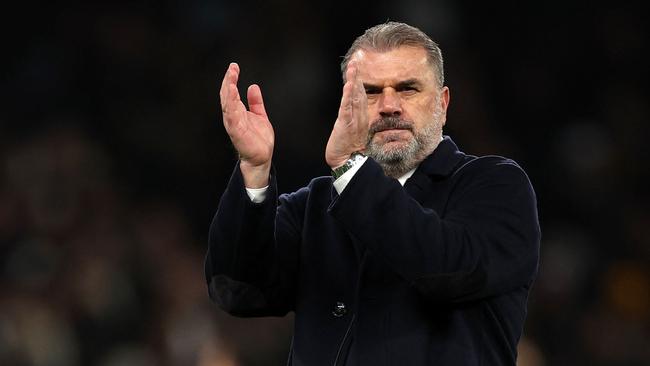 Ange Postecoglou applauds fans after the win. Photo by Adrian DENNIS / AFP.