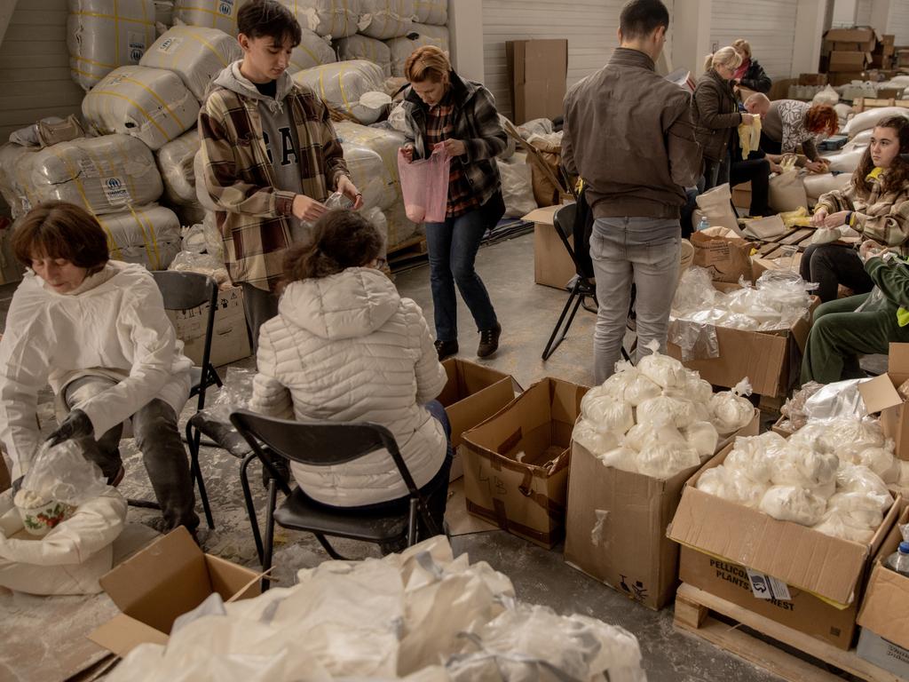 Volunteers work in a humanitarian aid facility in Zaporizhzhia, Ukraine. Picture: Chris McGrath/Getty Images