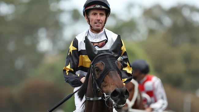 SYDNEY, AUSTRALIA - OCTOBER 12: Nash Rawiller riding Here To Shock wins Race 8 Alan Brown Stakes during Sydney Racing at Rosehill Gardens on October 12, 2024 in Sydney, Australia. (Photo by Jeremy Ng/Getty Images)